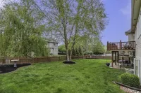 Large Cozy Retreat in West Omaha, Family Friendly with Game Rec Room!