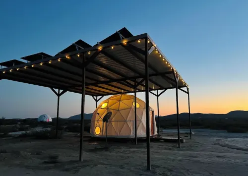 Southern Boho inspired Geodesic Dome nestled up next to Big Bend National Park.