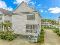 Steps to the beach/ Pool/  Ensuite bathrooms /Arcade/ beautiful safe community Hotels near Surfside Coin Laundry