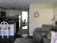 Relax and get away! Beautiful upscale condo with pool near OGT Village and Beach