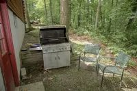 Lakeside Log Cabin with Cozy Stone Fireplace