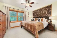 Logged & Loaded Cabin! 9Min to WISP! Hot tub, fire pit! Pets! EV charger!