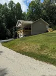 NEW house nestled in a quiet area. Has hot tub & game room. 5 min to down town.