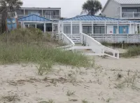30 Steps to the Beach! Luxury Condo with Large wrap-around porch!