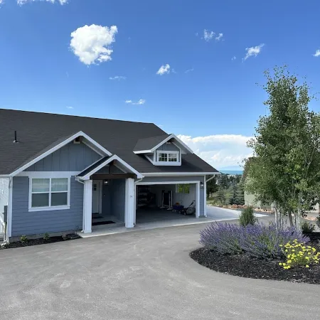 Blue Lake Retreat - fully-landscaped home sits on 2nd tee of Bear Lake G.C.