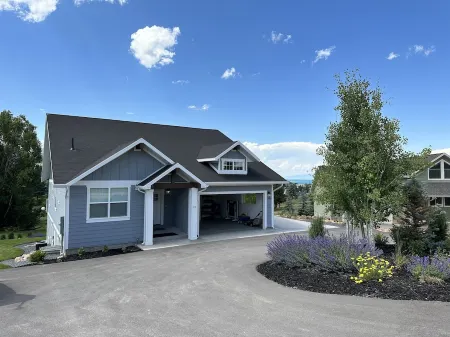 Blue Lake Retreat - fully-landscaped home sits on 2nd tee of Bear Lake G.C.