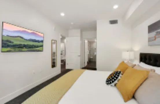 Pets Stay Free • Private Terrace • Elevator • King Beds • In-Unit W/D