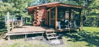The Copper Squirrel is a secluded full log cabin on 10 acres.