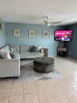 The beach is your backyard! Family size condo on Indian Shores! Sleeps 10!