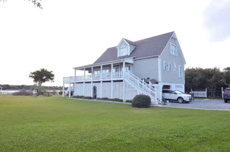 Beautiful ICW views!  Private pier, pool, hot tub, fire pits, and more!