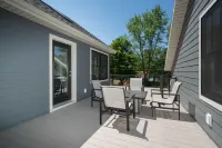 AMAZING NEWER HOME WITH LAKE VIEWS, steps away from shops and restaurants.