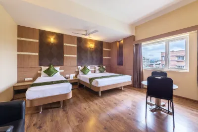 Treebo Ess Grande Hotels near Coimbatore Jn