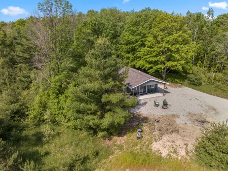 Cozy Getaway with Fire Pit and Charcoal Grill - Rustic Modern Retreat