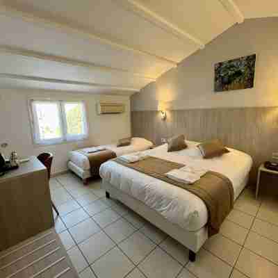Hôtel les Arcades Rooms