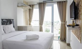 Minimalist Studio Apartment at Poris 88 with City View