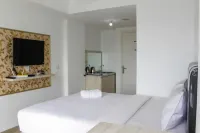 Minimalist Studio Apartment at Poris 88 with City View