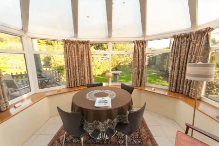 Greyfield Farm Cottages Отели в г. Клаттон