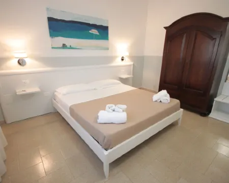 Punta Prosciutto Bed Hotels in Torre Lapillo