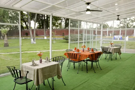 Hotel Finca Las Hortensias Отели в г. Тепоцотлан