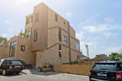 Batroun Bahsa Bay Hotels near Botrys,statue of sponge diver