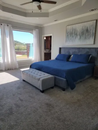 Luxury lake front retreat! Family and pet friendly with fishing access!