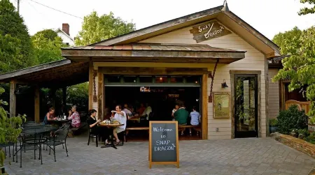 "Cabin in the City" available for your pleasure. Walk to Downtown Burnsville.