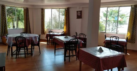 Denzong House & Restaurant Отели в г. Калимпонге