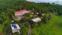 Feather Leaf Inn Hotels near St George Village Botanical Gardens