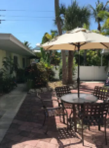 An Island Getaway at Palm Tree Villas -  Ferienhäuser