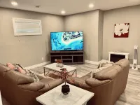 Cozy 2 bedroom basement with 2 beds, kitchen, 75’’ TV and bathroom