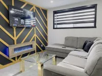 Designer suite with a Pool Table/Xbox/Arcade/Jumbo Jenga Hotels in Airdrie