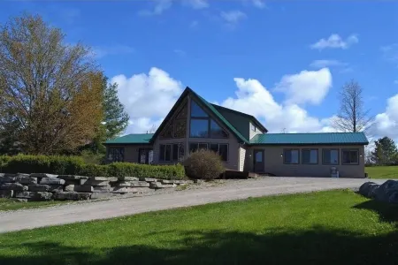 Lake Charlevoix View- 10 Acre  Private Retreat, Sleep from 2- 8 persons.