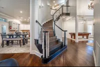 Large 5-bedroom house with WiFi, salt water pool, pool table and shuffle board!