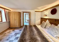 Der Erlacher Alpenrefugium 1874 Luxury & Privacy Hotels in Jochberg