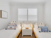 3-Bed Haven with Balcony and BBQ, 5-Min to Beach