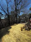 Quiet cabin in the woods w/ access to pools, river, & lakes in gated community!!