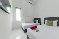Urbanview Hotel la de Grizz Syariah Sampit by RedDoorz - 2 estrellas
