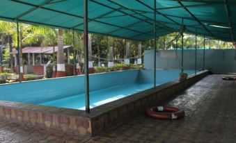 Pooja Farm Resort - Housity