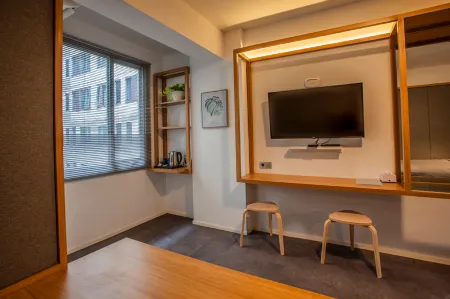 Grand Suite Reqhome Apartment Отели рядом с достопримечательностью «Таман Гейсибу Мини»