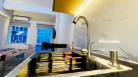 Patraland Urbano Apartment by SiniBobo