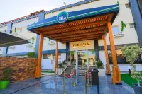 The Palm Hotel Hoteles cerca de Omar Effendi
