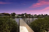 Seaside Oasis! Dog-Friendly, Waterfront, Private Dock, Saltwater Pool & Spa,