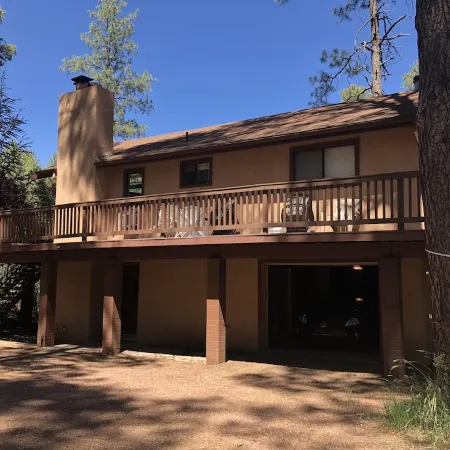 Privacy! One  & 1/2 acre with wrap around deck. Backs the National Forest.