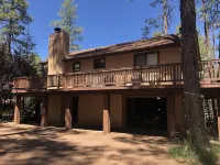 Privacy! One  & 1/2 acre with wrap around deck. Backs the National Forest.