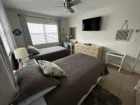 Condo with pool, walking distance to beach, groceries and several restaurants