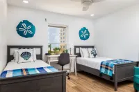 Ocean View! 100 steps to feet in the sand! Super Clean!