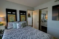Beautiful condo with personal balcony in our oceanfront complex .