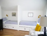 Charming modern bungalow w/ hot tub steps away from the beach