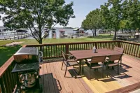 Bright, open concept, lakefront house on open water with amazing sunset views!