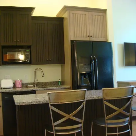 NEW LUXURY TWO-BEDROOM CONDOMINIUM WITH IN TOWN LOCATION & HALF MILE FROM BEACH
